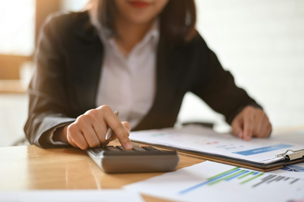 Woman with calculator