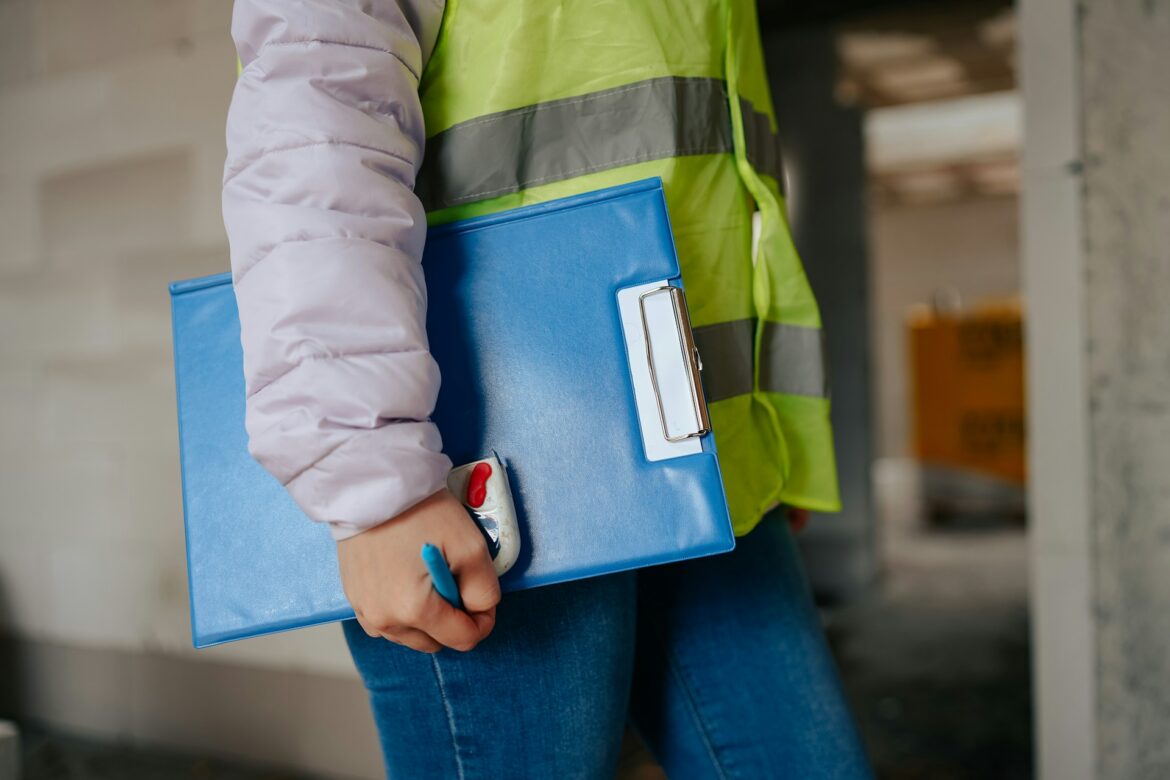 Worker with clipboard