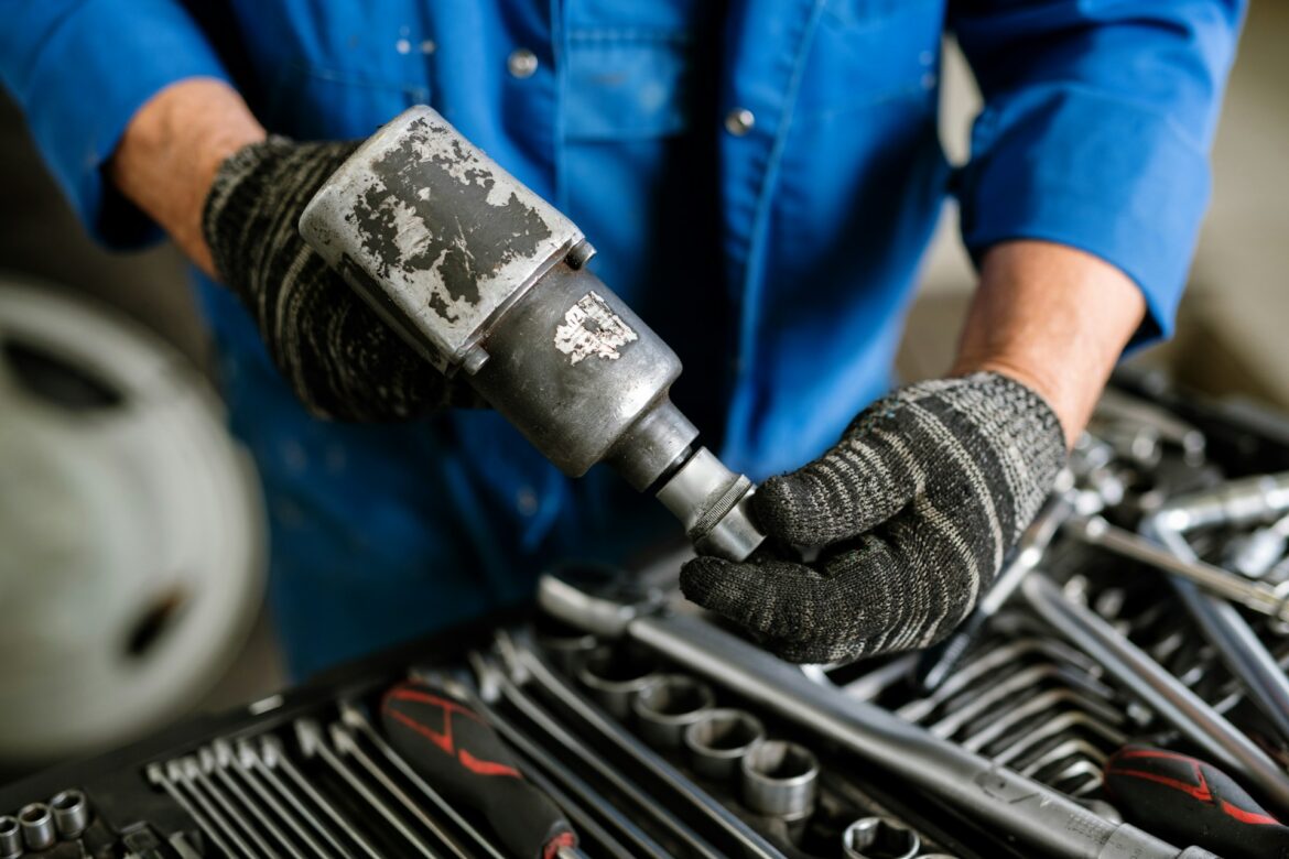 Worker with a tool